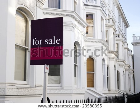 Luxury townhouses with "for sale" sign and copy space.  at Kensington area(London).