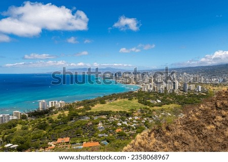 Wide angle view of Honolulu city from Diamond Head lookout, with Waikiki beach landscape and ocean views. Royalty-Free Stock Photo #2358068967
