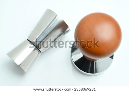Coffee powder tempering tool on white background close up