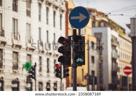 Bicycle traffic light with a prohibitory green signal. New countdown item on the top of a traffic light. Green cycle traffic light in the city of Italy. Sustainable transport. bike-friendly. 