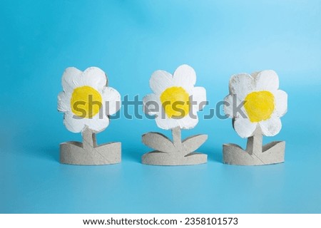 toilet paper roll craft concept for kid and kindergarten, DIY, tutorial, summer or spring flower toy, recycle art Royalty-Free Stock Photo #2358101573