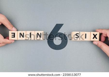 Six or Nine, different answers from the perspective and point of view, opposite view from above shot Royalty-Free Stock Photo #2358113077
