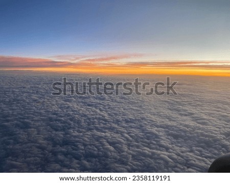 The beauty of the universe during the sunset coming, on more than 30,000 ft. The magnificent views