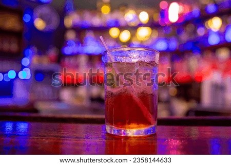 Vodka cranberry cocktail on a bar top Royalty-Free Stock Photo #2358144633