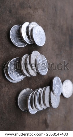 pile of Indonesian coins. economic growth with piles of coins             