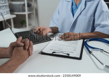 Asian female doctor or medical specialist examining a patient Ask for symptoms, give advice, recommend medication, plan treatment guidelines and preventive care. Concept of health checkup Prevention