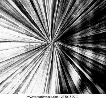 A black and white image of a sunburst Royalty-Free Stock Photo #2358157011