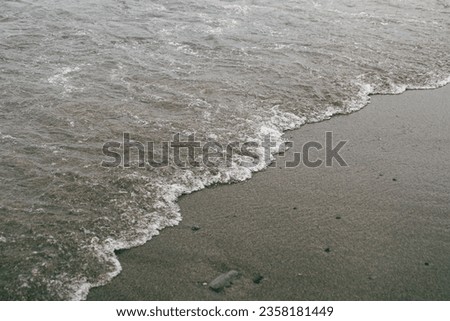 Detail intricate coastal wave movements.