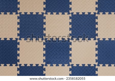 foam flooring tiles or jigsaw mat for baby. background and texture