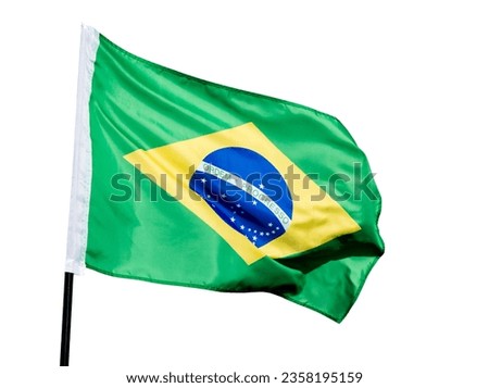 Brazilian flag waving against white background