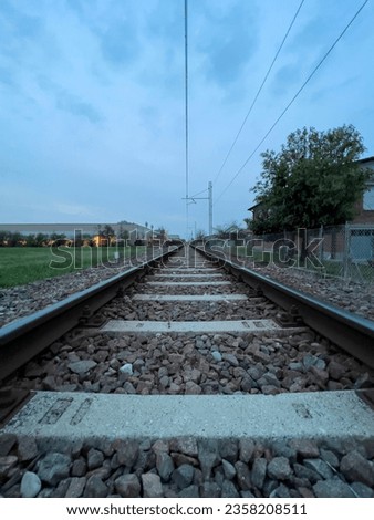 train track at sunset into the unknown. High quality photo