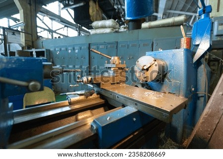 Picture of a factory turning parts in a train locomotive shop