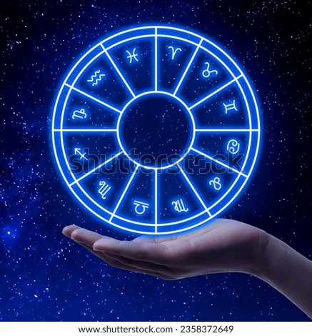 Astrology. Woman with zodiac wheel against starry night sky, closeup