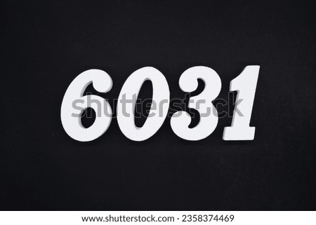 Black for the background. The number 6031 is made of white painted wood.