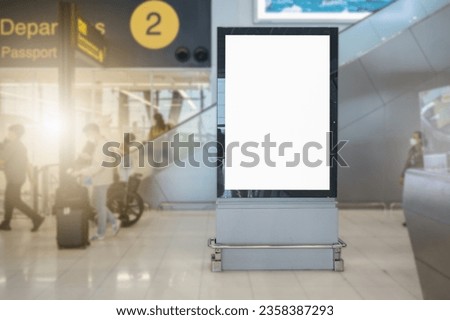 Blank billboard at the airport.Blurred background, travel concept.