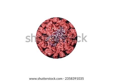 Raw mince beef, ground meat. Black background. Top view. Copy space