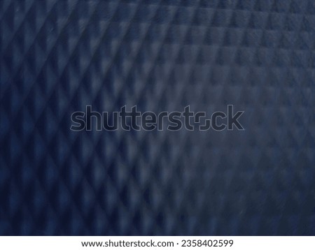 Stylish abstract background in dark blue. Rhombus pattern.
