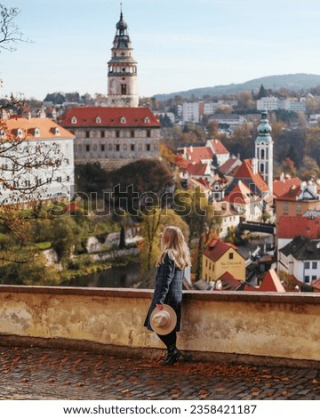 Girl tourists smiling with beautiful Panoramic view of Cesky krumlov ,Czech Republic landmark of Czech. Royalty-Free Stock Photo #2358421187