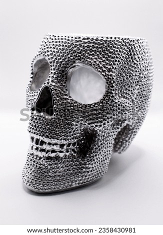 Rhinestone skull on a white background Royalty-Free Stock Photo #2358430981