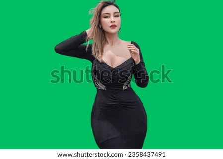 Adorable Girl Posing on a Green Screen Background