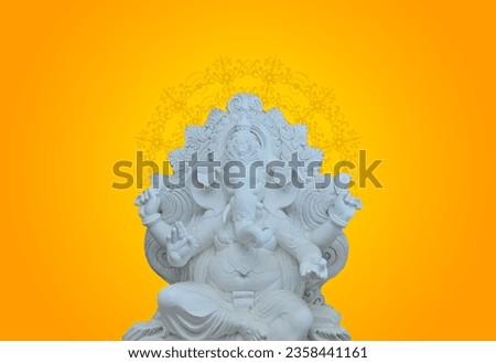 antique White lord ganesha Idol on yellow festive background.
