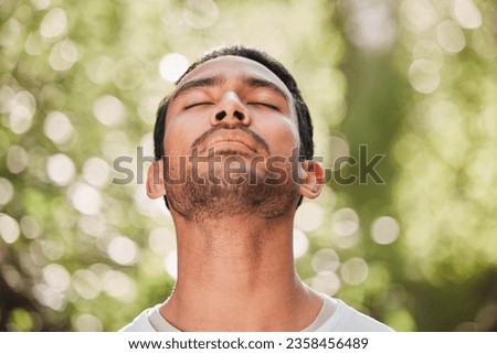 Man, breathing and relax with peace in nature for exercise, workout or meditation for zen after fitness for spiritual wellness. Calm, athlete and freedom in environment and training mindfulness Royalty-Free Stock Photo #2358456489