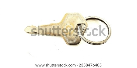 "An enticing picture of a locker key, embodying the essence of security and secrecy. Details and contrast create allure in simplicity."