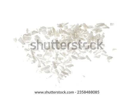 Fresh coconut flakes on white background, top view. Close up Royalty-Free Stock Photo #2358488085