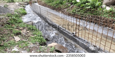 photo of irrigation canal construction using wiremesh.