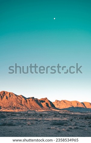Vertical view of desert mountains and (probably) Jupiter Royalty-Free Stock Photo #2358534965