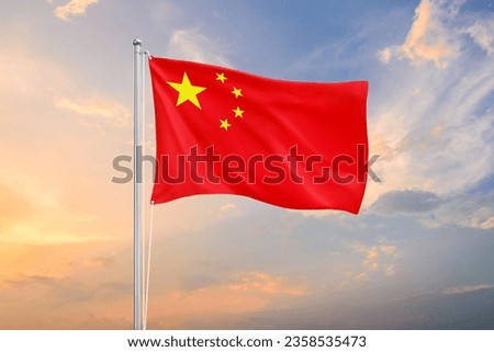 China flag waving on sundown sky