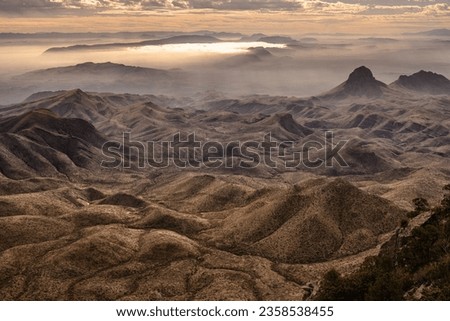 Fog Clings to Hills of Chihuahuan Desert in Big Bend National Park Royalty-Free Stock Photo #2358538455