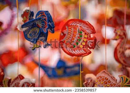 Blurred background beautiful lantern. Decorated colorful lanterns hanging on a stand in the streets in Ho Chi Minh City, Vietnam during Mid Autumn Festival. Chinese language in photos mean happiness