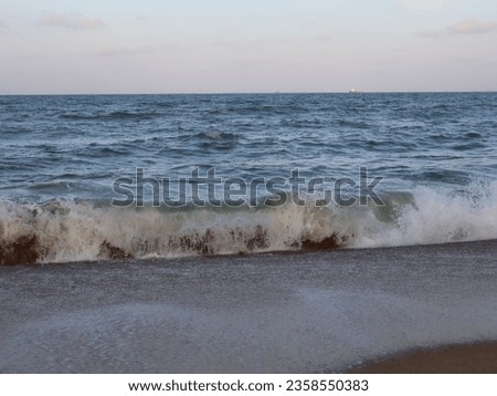 Beach and wave of blue ocean on sand summer background