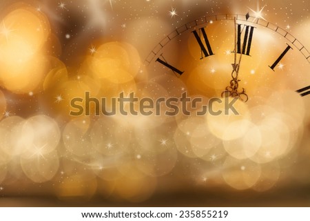 New Year's at midnight - Old clock with stars snowflakes and holiday lights Royalty-Free Stock Photo #235855219