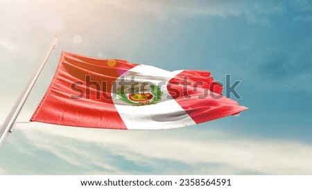 Peru national flag waving in beautiful sky.