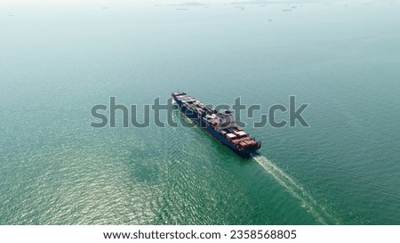 cargo container ship sailing full speed in sea to import export goods and distributing products to dealer and consumers worldwide, by container ship Transport, business logistic delivery service,