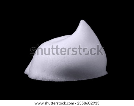 liquid white hand-washing foam from soap or shampoo or shower gel. abstract soap bubble isolated on black background