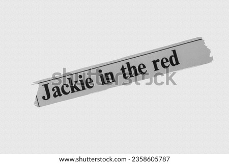 Jackie in the red - news story from 1975 UK newspaper headline article title Royalty-Free Stock Photo #2358605787