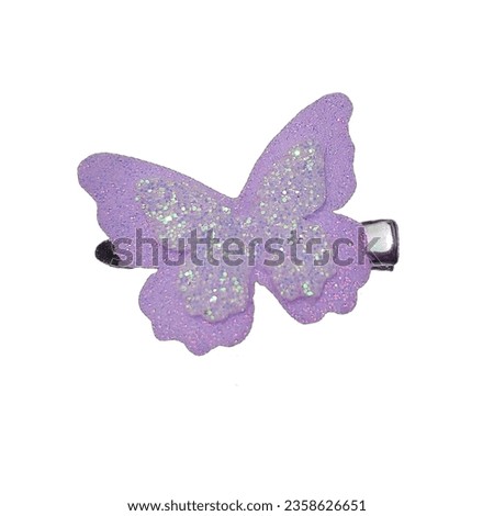 Beautiful purple butterfly hair clip with glitter, isolated background. Royalty-Free Stock Photo #2358626651