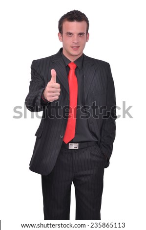 Young attractive busienssman thumbs up