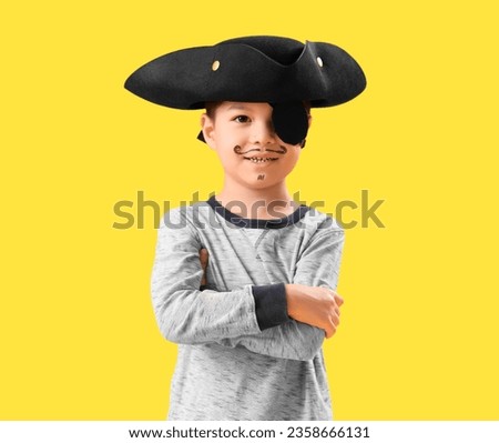 Cute little pirate on yellow background