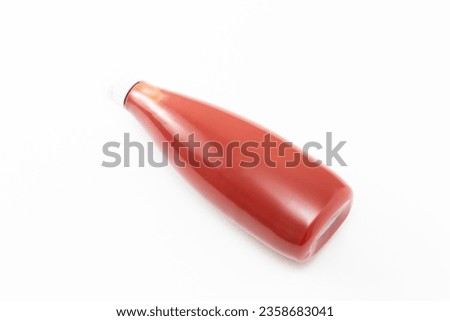 Ketchup tube on a white background.