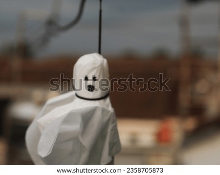 Photo of a teru teru bozu doll that is hung to predict the weather according to Japanese beliefs, SHOTLISTspooky
