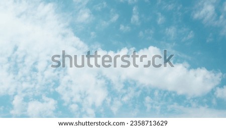 Thin white clouds and blue sky. A soft relaxing sky image