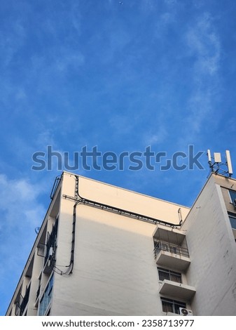 Apartment buildings on a sunny day with a blue sky
