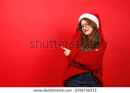 A stylish woman in a Santa hat, expressing holiday joy with a festive background and happy emotion.