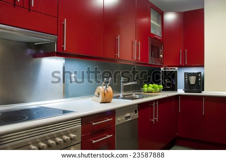 modern kitchen in red and grey colors Royalty-Free Stock Photo #23587888