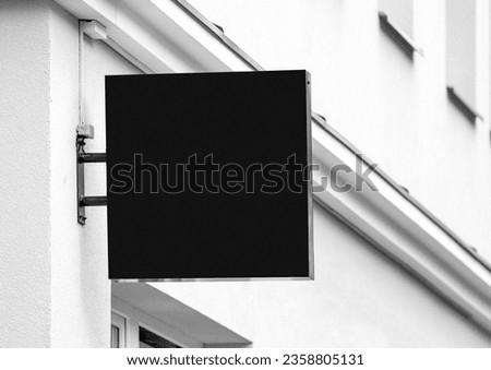 Black empty outdoor business signage mockup to add company logo