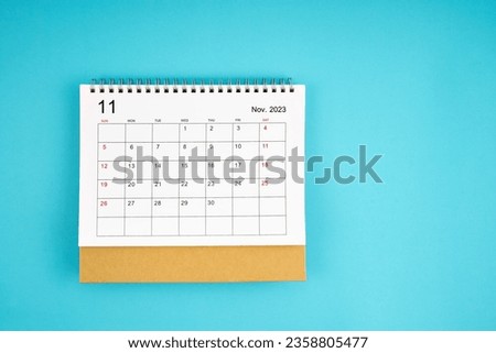 November 2023, Monthly desk calendar for 2023 year on yellow color background.